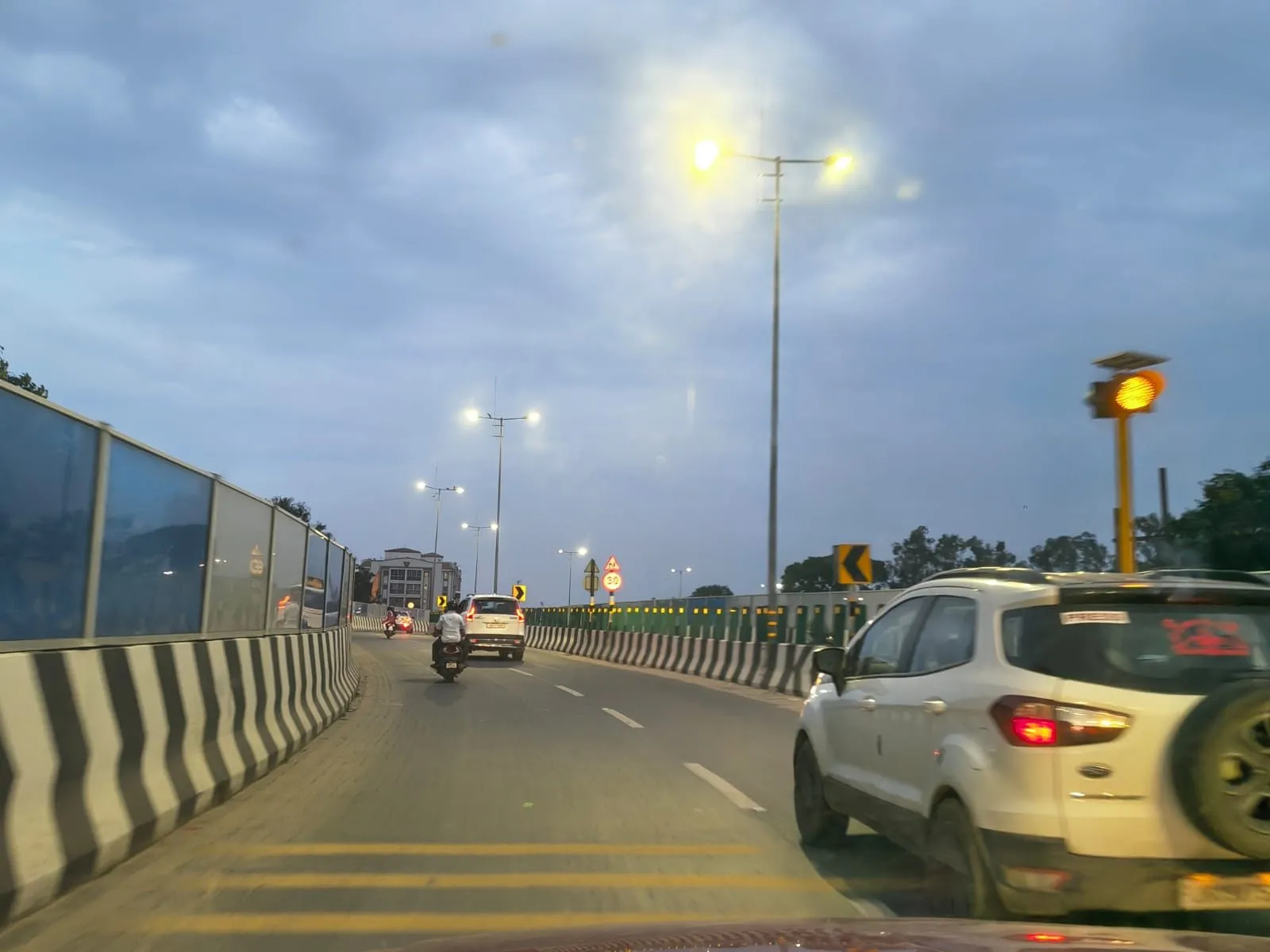 Highway street lighting and utility corridor along the elevated approach